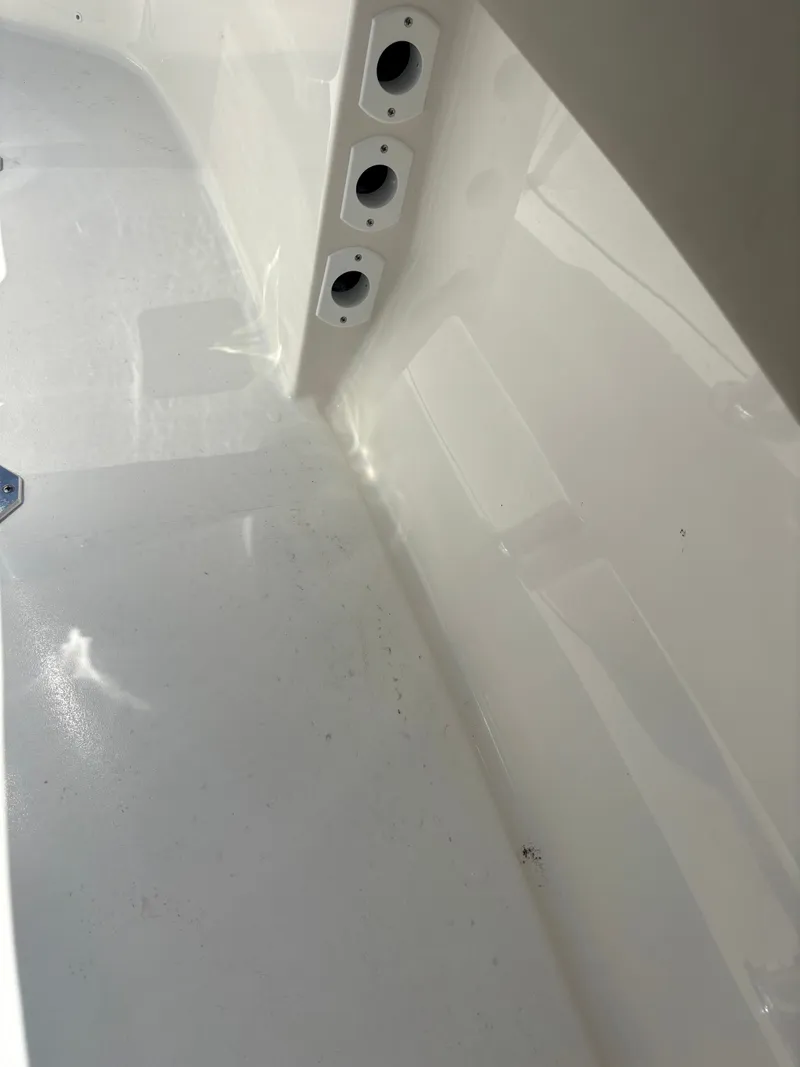 Slide: The Image of Interior view of a 2026 Key West 203 FS boat, showcasing clean white surfaces. - 22