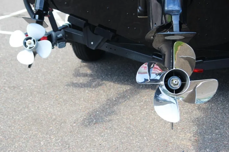 Slide: The Image of Propellers of a 2022 Crestliner 2100 Raptor boat on a trailer. - 11