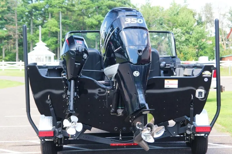 Slide: The Image of 2022 Crestliner 2100 Raptor boat with powerful 350 horsepower engine, rear view. - 13