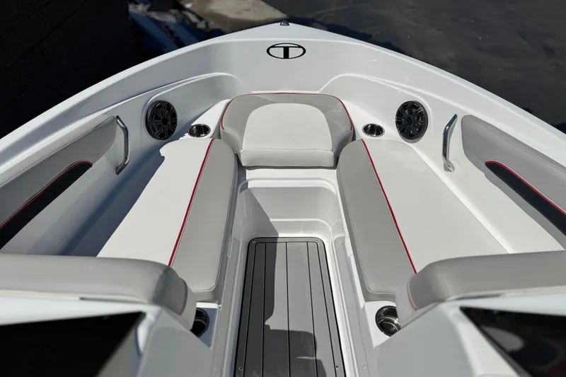 Slide: The Image of Interior of 2021 Tahoe T700 boat with cushioned seating and speakers. - 10