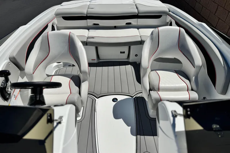 Slide: The Image of Interior of 2021 Tahoe T700 boat with white seating and modern design. - 13