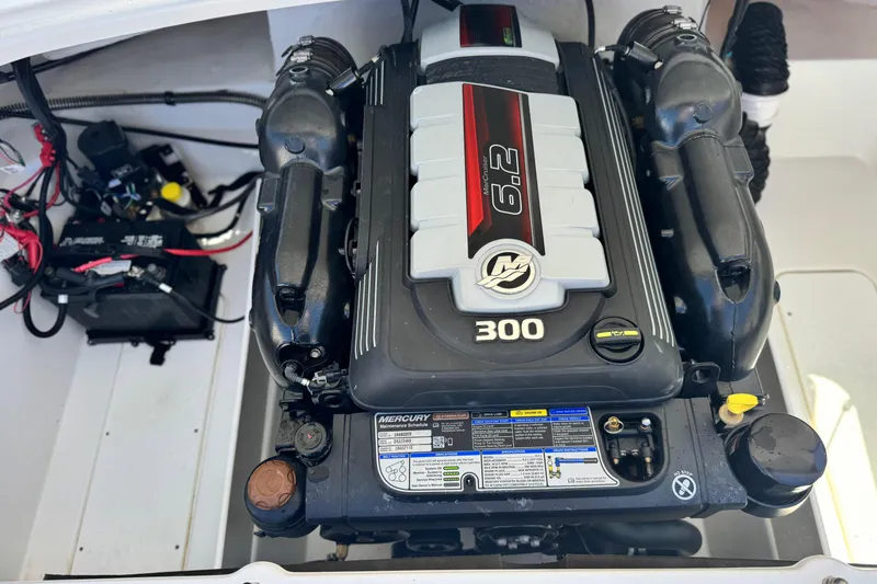 Slide: The Image of 2021 Tahoe T700 engine compartment featuring a Mercury 6.2L 300 horsepower engine. - 18