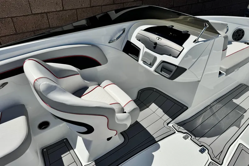 Slide: The Image of 2021 Tahoe T700 boat interior with sleek white seating and modern dashboard design. - 19
