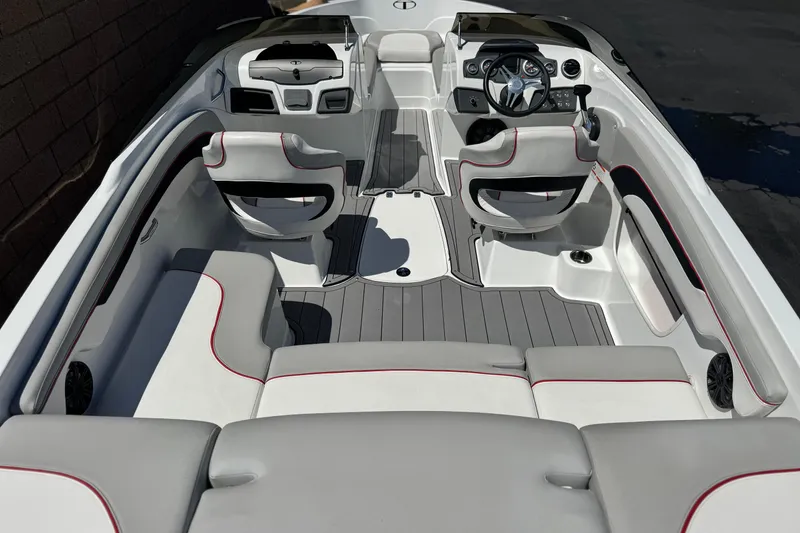 Slide: The Image of 2021 Tahoe T700 boat interior with sleek seating and modern dashboard design. - 8