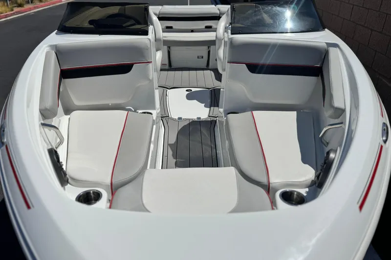 Slide: The Image of Interior of 2021 Tahoe T700 boat with white seating and red accents. - 9