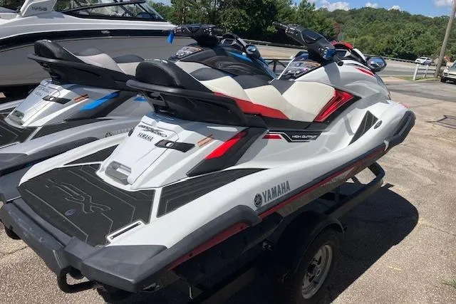 Slide: The Image of 2020 Yamaha WaveRunner FX Cruiser HO on trailer, parked outdoors. - 2