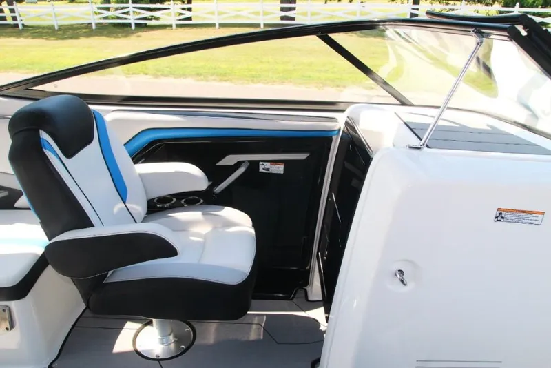 Slide: The Image of 2019 Yamaha Boats 242X interior with sleek seating and modern design. - 11