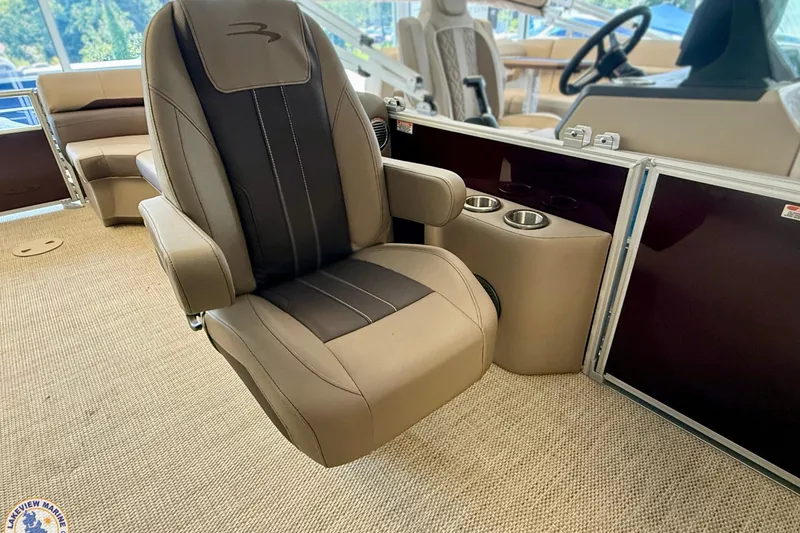 Slide: The Image of Luxurious seating on 2025 Bennington 22 SXSR boat with cup holders and elegant design. - 5