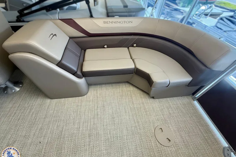Slide: The Image of 2025 Bennington 22 SXSR boat interior with plush seating and modern design. - 7