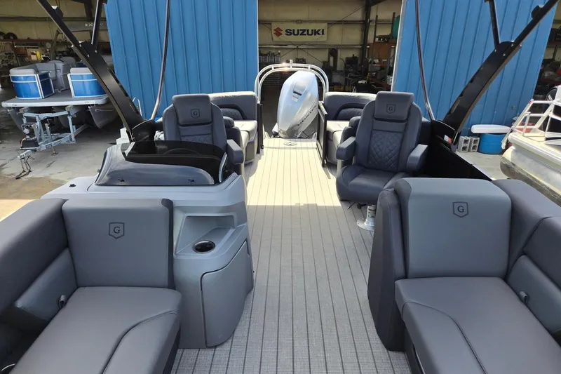Slide: The Image of 2026 Godfrey SWEETWATER 2286 SB pontoon boat interior with luxurious seating and modern design. - 13