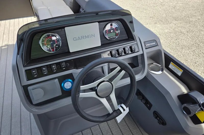 Slide: The Image of Steering console of 2026 Godfrey SWEETWATER 2286 SB with Garmin display and controls. - 20