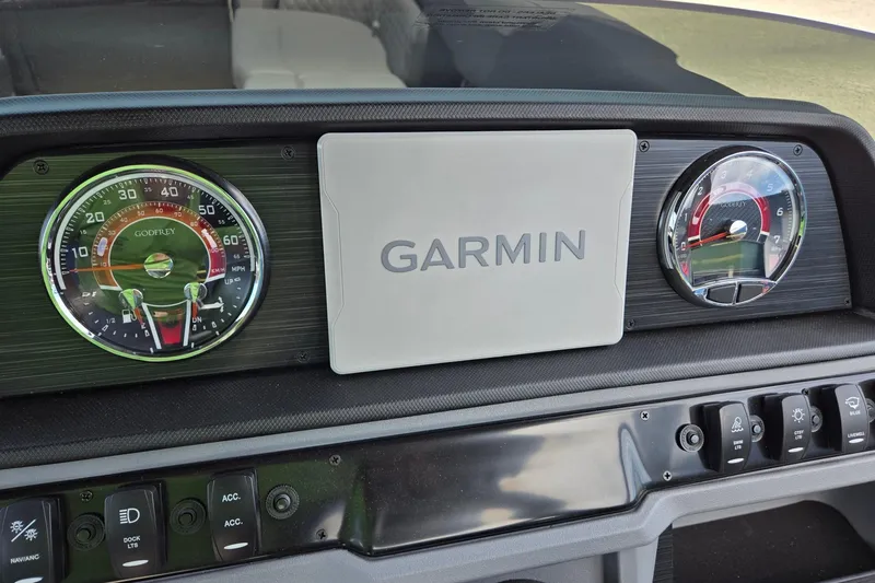 Slide: The Image of Dashboard of 2026 Godfrey SWEETWATER 2286 SB with Garmin display and gauges. - 21