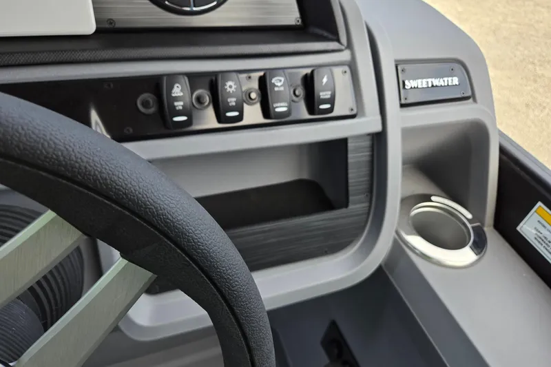 Slide: The Image of Dashboard of 2026 Godfrey SWEETWATER 2286 SB with steering wheel and control panel. - 23