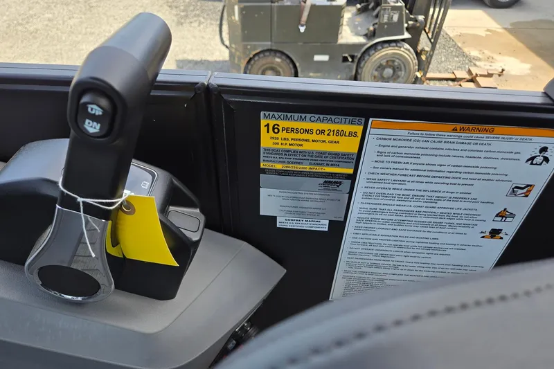 Slide: The Image of Control panel of 2026 Godfrey SWEETWATER 2286 SB with capacity and safety warnings. - 25