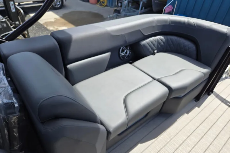 Slide: The Image of 2026 Godfrey SWEETWATER 2286 SB boat interior with luxurious gray seating. - 27