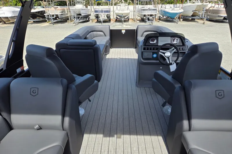 Slide: The Image of 2026 Godfrey SWEETWATER 2286 SB pontoon boat interior with modern seating and helm. - 32