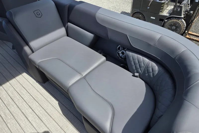 Slide: The Image of Luxurious seating on 2026 Godfrey SWEETWATER 2286 SB pontoon boat, featuring sleek gray upholstery. - 34