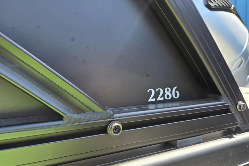 Slide: The Image of Close-up of Godfrey SWEETWATER 2286 SB boat detail, model year 2026. - 44