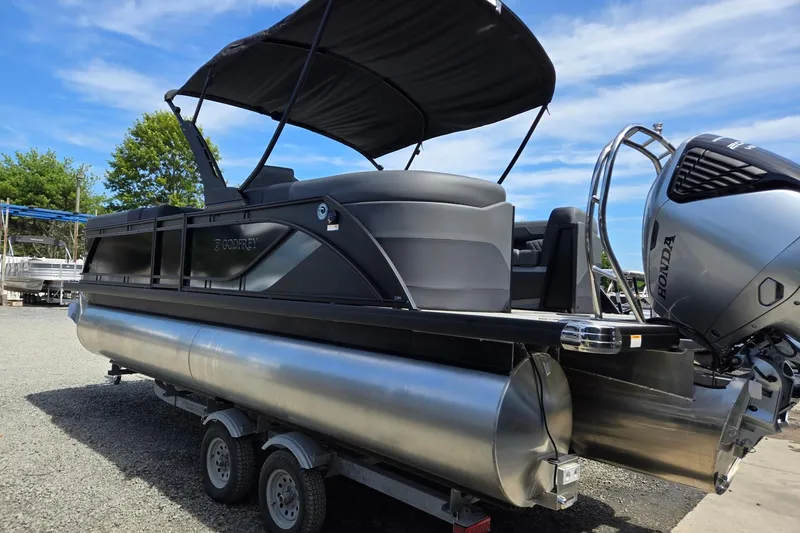 Slide: The Image of 2026 Godfrey SWEETWATER 2286 SB pontoon boat with Honda engine on trailer. - 6