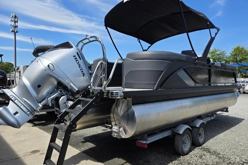 Slide: The Image of 2026 Godfrey SWEETWATER 2286 SB pontoon boat with Honda outboard motor on trailer. - 8