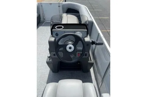 Slide: The Image of 2026 Sun Tracker Bass Buggy 16 DLX pontoon boat steering console. - 4