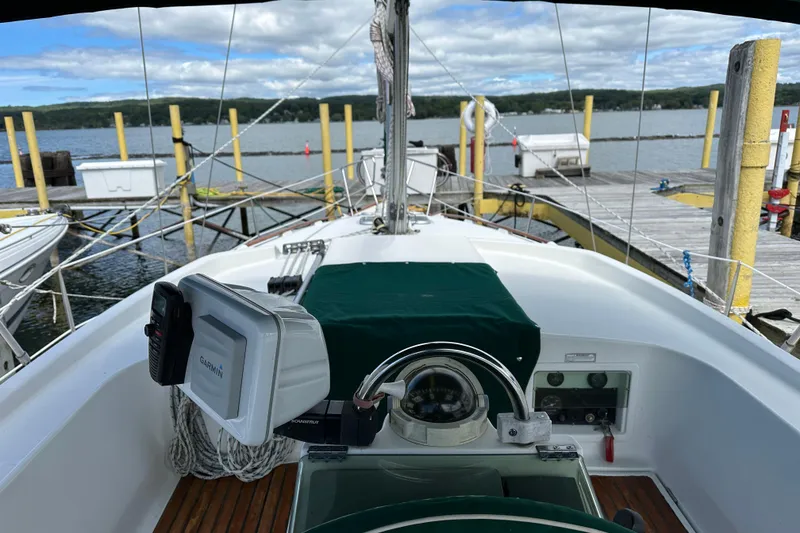 Slide: The Image of Beneteau Oceanis 36 CC sailboat cockpit view, docked at a marina, 2000 model. - 23