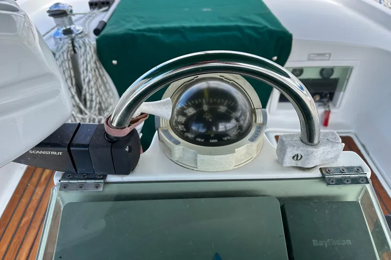 Slide: The Image of Compass and navigation equipment on a 2000 Beneteau Oceanis 36 CC sailboat. - 25