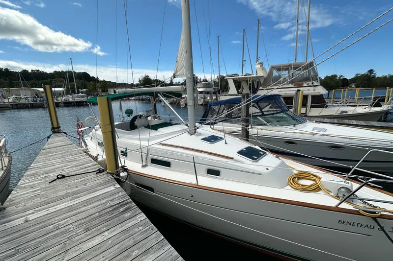 Slide: The Image of Beneteau Oceanis 36 CC sailboat docked at marina, 2000 model, clear sky. - 3