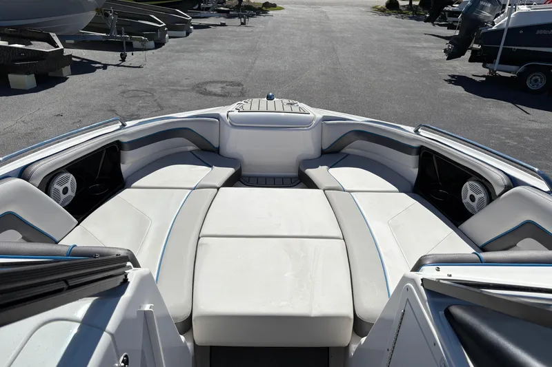 Slide: The Image of 2020 Yamaha Boats AR240 interior with spacious seating and modern design. - 13