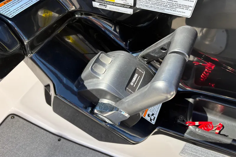 Slide: The Image of Close-up of 2020 Yamaha AR240 boat throttle control with safety lanyard. - 16