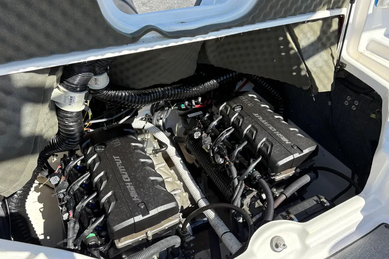 Slide: The Image of 2020 Yamaha Boats AR240 engine compartment with dual high-output engines. - 18