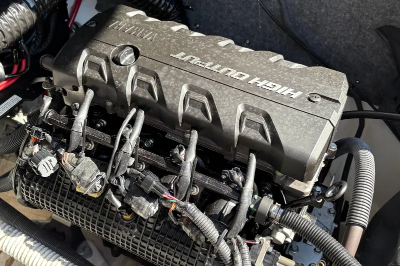 Slide: The Image of 2020 Yamaha AR240 engine, showcasing high output performance components and wiring. - 19