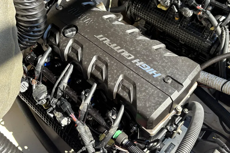 Slide: The Image of 2020 Yamaha AR240 engine compartment showcasing high output engine components. - 20