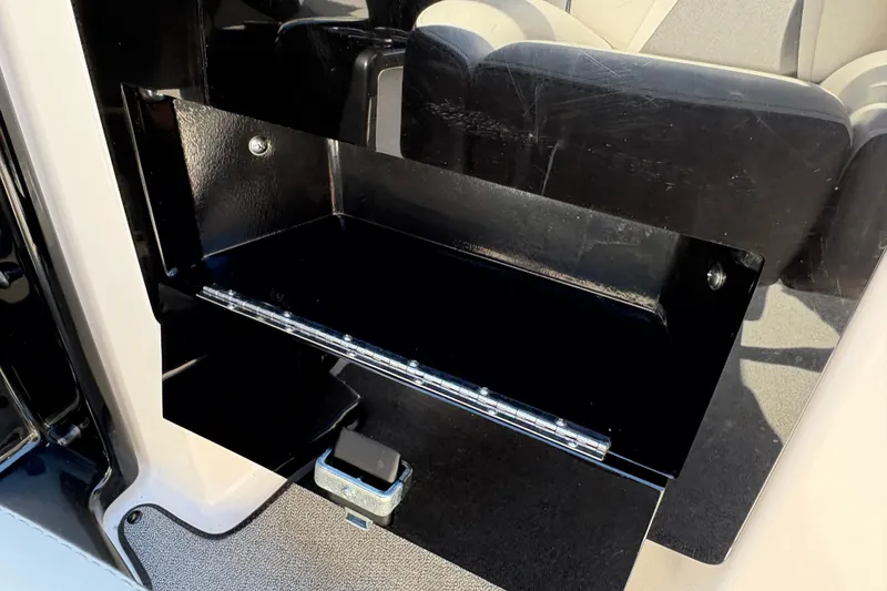Slide: The Image of 2020 Yamaha AR240 boat interior storage compartment with black finish. - 26