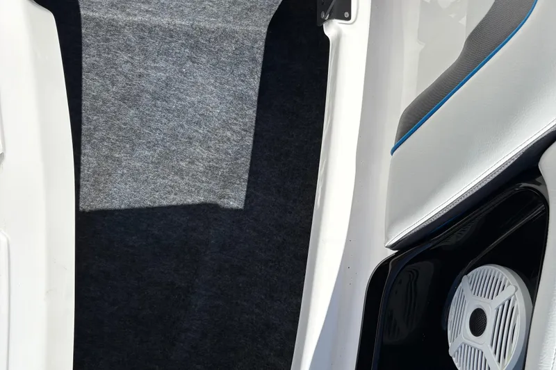 Slide: The Image of Interior view of 2020 Yamaha AR240 boat, featuring seating and speaker details. - 27