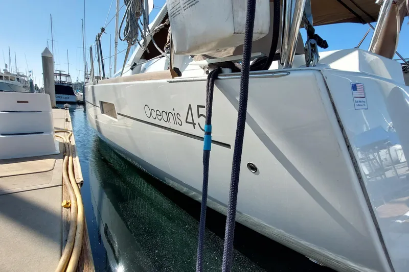 Slide: The Image of 2015 Beneteau Oceanis 45 yacht docked at marina, side view. - 10