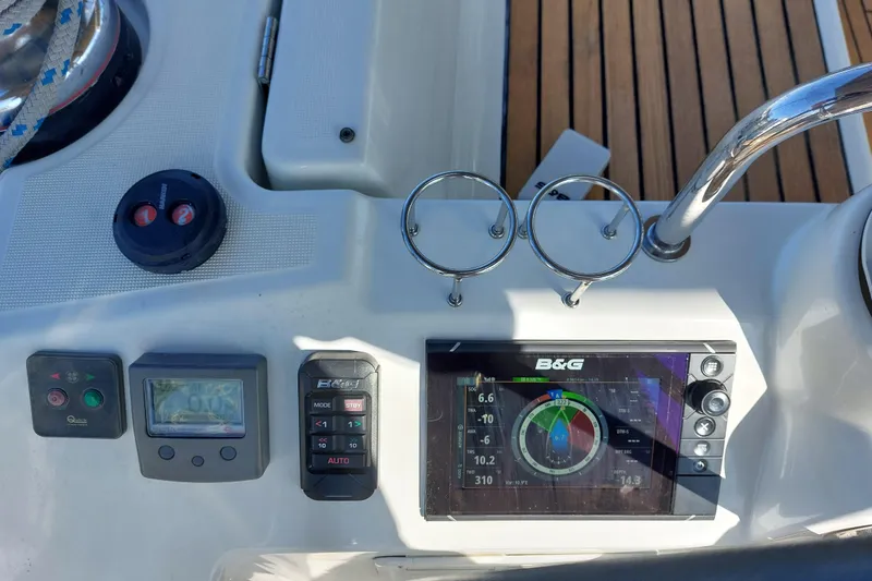Slide: The Image of Beneteau Oceanis 45 yacht cockpit with navigation instruments and controls, 2015 model. - 29