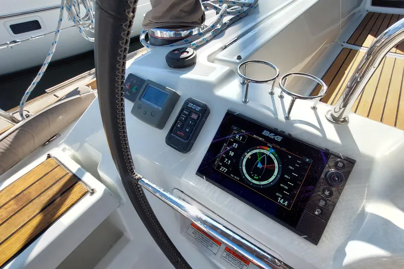 Slide: The Image of Beneteau Oceanis 45 cockpit with navigation display and controls, 2015 model. - 34