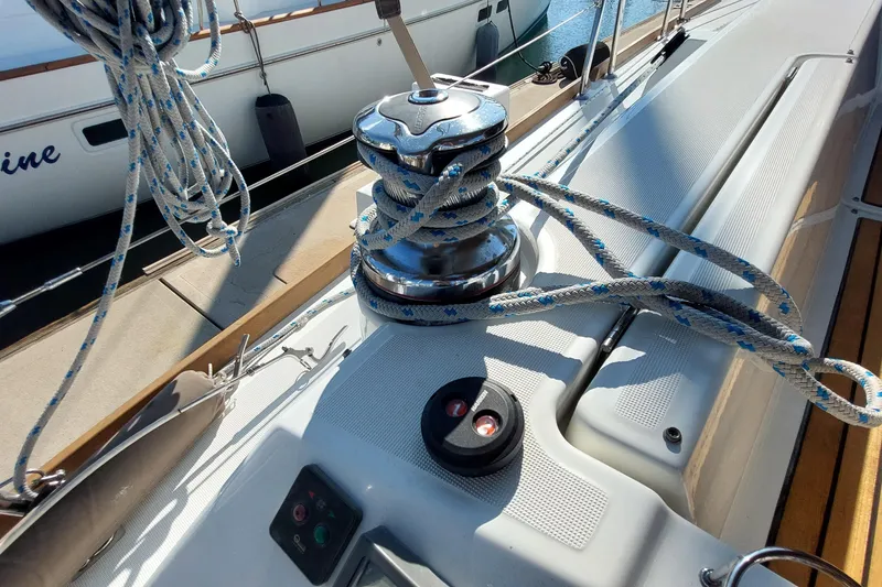 Slide: The Image of Winch and ropes on 2015 Beneteau Oceanis 45 sailboat deck. - 36