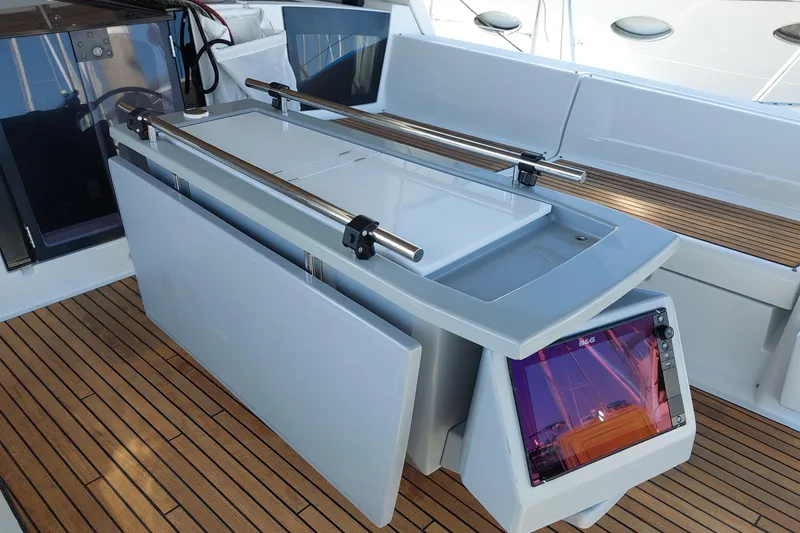 Slide: The Image of Cockpit of 2015 Beneteau Oceanis 45 with sleek design and modern navigation equipment. - 40