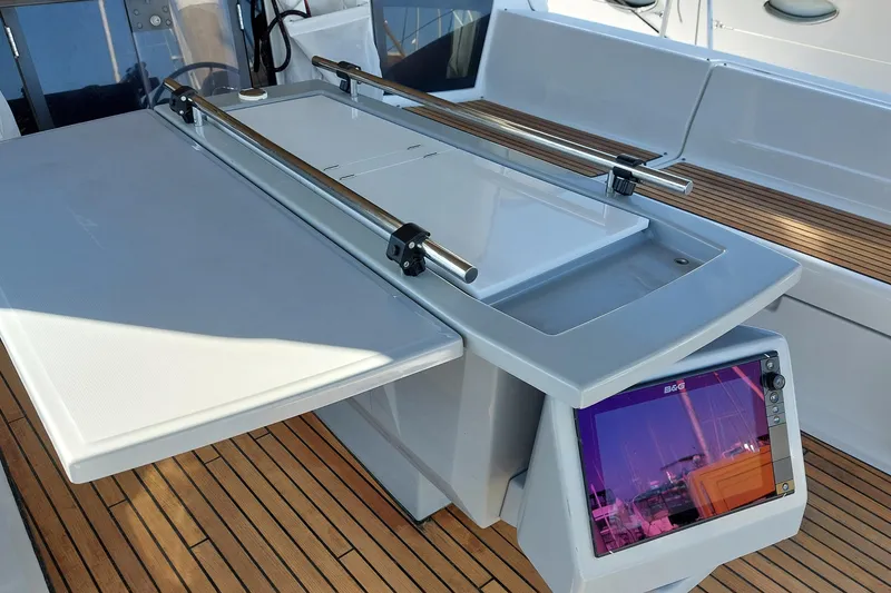 Slide: The Image of Beneteau Oceanis 45 cockpit with navigation equipment and teak flooring, 2015 model. - 41
