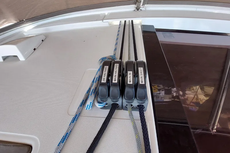 Slide: The Image of Rope clutches on a 2015 Beneteau Oceanis 45 sailboat deck. - 43