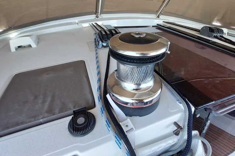 Slide: The Image of Winch and ropes on 2015 Beneteau Oceanis 45 sailboat deck. - 45