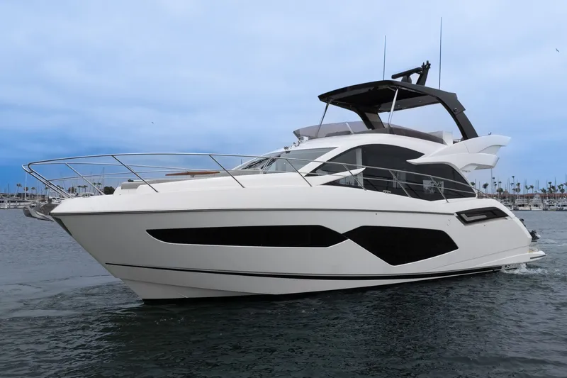 The Image of 2021 Sunseeker Manhattan 55 yacht cruising on calm waters. - 0