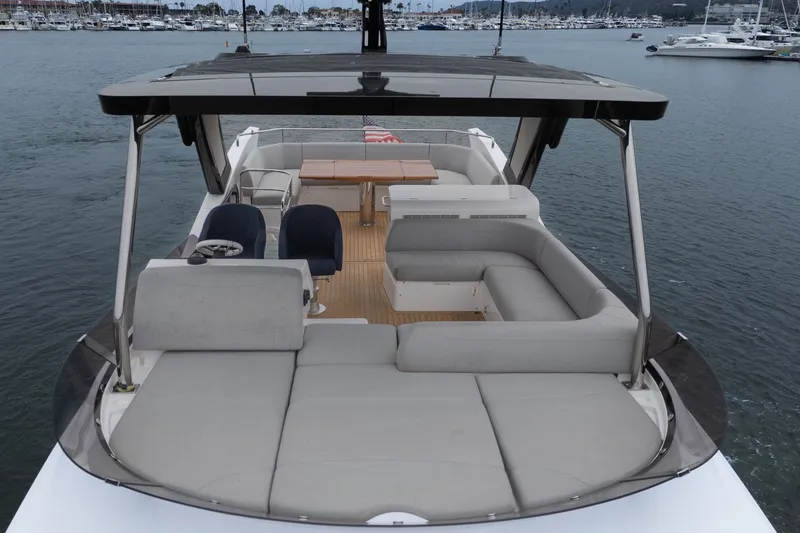 Slide: The Image of Luxurious 2021 Sunseeker Manhattan 55 yacht with spacious deck and seating area. - 14