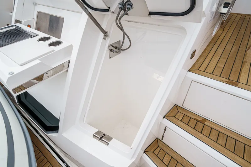Slide: The Image of Sunseeker Manhattan 55 yacht deck with shower and wooden steps, 2021 model. - 35