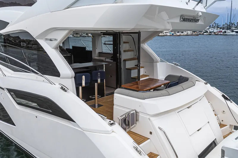 Slide: The Image of Luxury Sunseeker Manhattan 55 yacht, 2021 model, featuring elegant outdoor seating and modern design. - 37