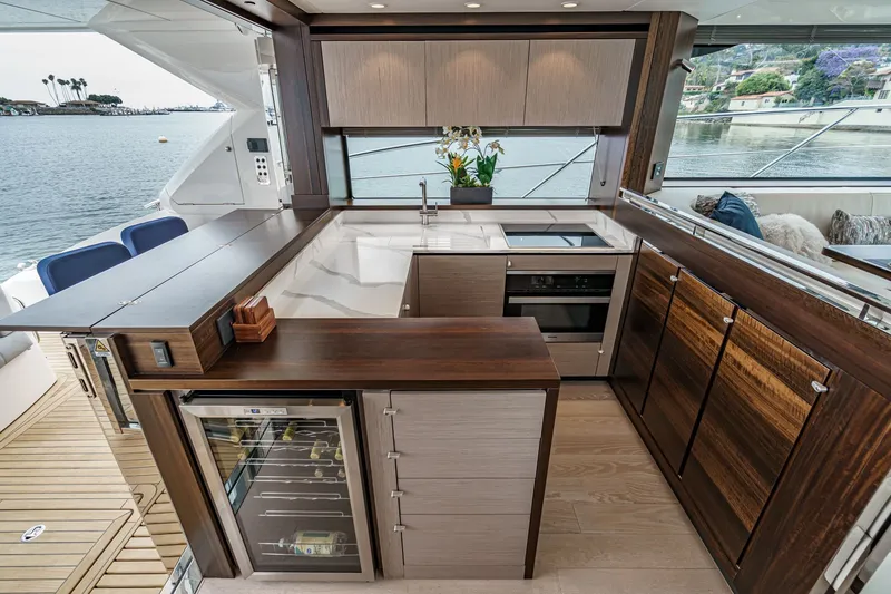 Slide: The Image of Luxurious kitchen interior of 2021 Sunseeker Manhattan 55 yacht with modern appliances and waterfront view. - 45