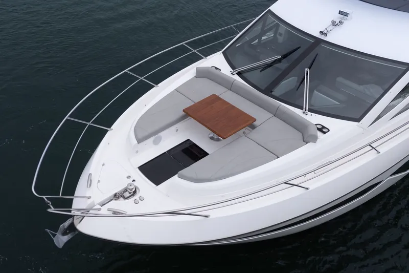 Slide: The Image of Sunseeker Manhattan 55 yacht bow with seating and table, 2021 model. - 7