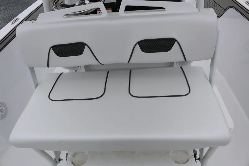 Slide: The Image of 2025 Wellcraft 202 Fisherman boat seat with white upholstery and black accents. - 15